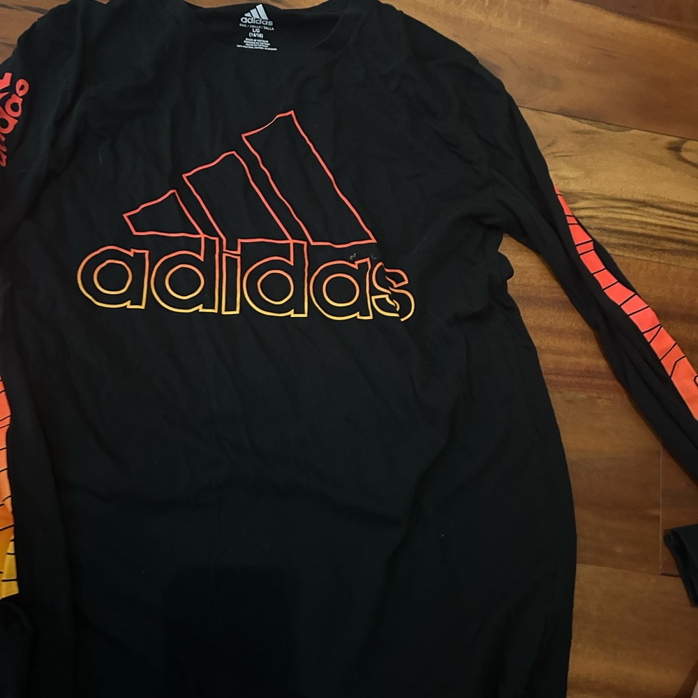 Adidas Black Shirt with Orange Details